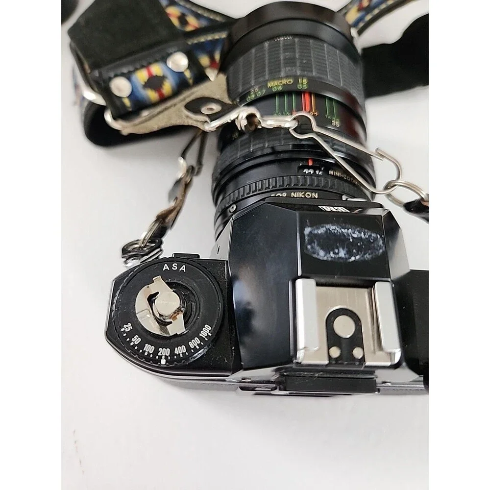 Nikon EM 35mm SLR Film Camera Black Body w/ Extra Lens, Bag & Accessorie